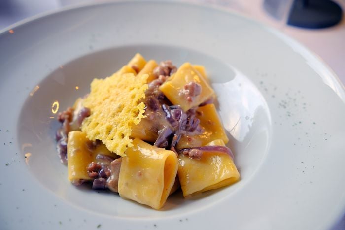 Paccheri con salsiccia, cipolla rossa di Tropea e Bagoss - Osteria Valle Bresciana - Brescia